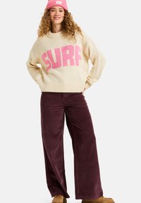 Длинный пуловер