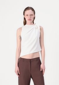 Блузка без рукавов