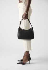 Кожаная сумка