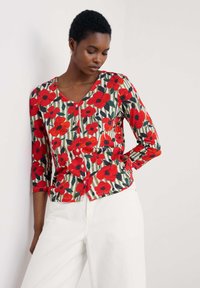 Вязаная кофта