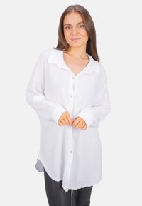 Длинная блузка