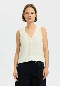 Блузка без рукавов