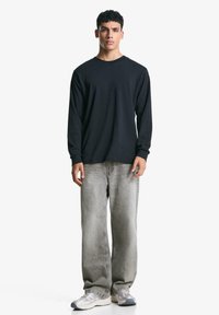 Свободные джинсы Свободные джинсы