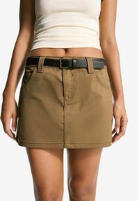 Юбка с накладными карманами