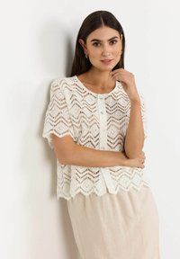 Вязаная кофта