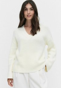 Длинный пуловер