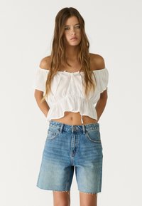 Джинсовые шорты