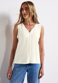 Длинный топ