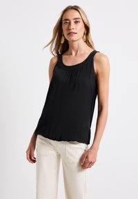 Длинный топ