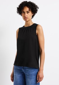 Длинный топ