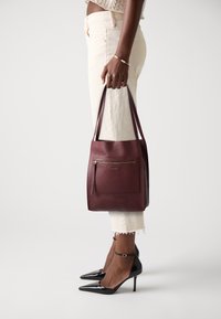 Кожаная сумка