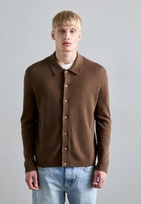 Вязаная кофта