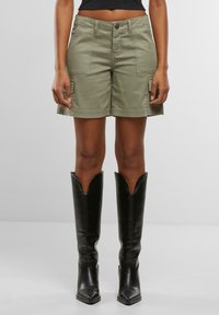 Юбка с накладными карманами Юбка с накладными карманами