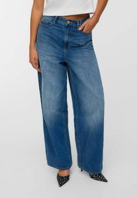 Свободные джинсы Свободные джинсы