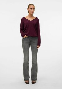 Клешеные джинсы Клешеные джинсы