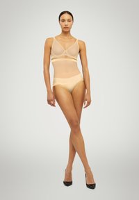 Бюстгальтер на косточках