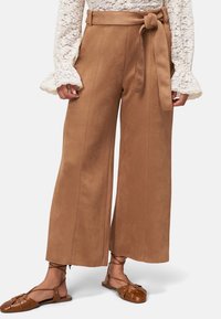 Широкие брюки Широкие брюки