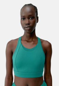 Спортивный бюстгальтер Спортивный бюстгальтер