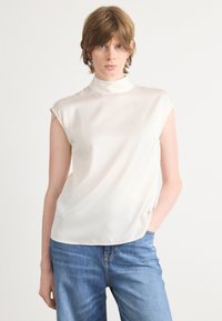 Шелковая блузка