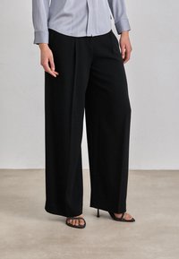 Брюки Брюки