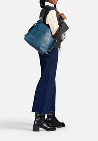 Кожаная сумка