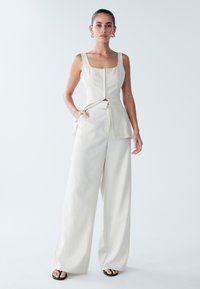 Широкие брюки Широкие брюки