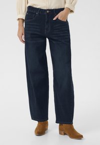 Свободные джинсы