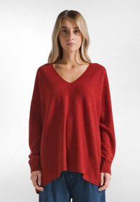 Длинный пуловер