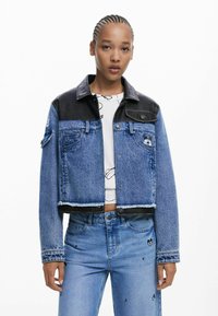 Джинсовая куртка