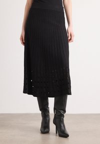 Вязаная юбка Вязаная юбка