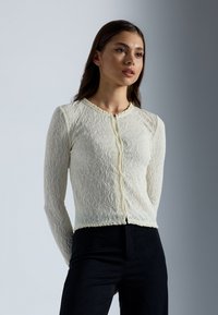 Вязаная кофта