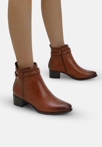 Ковбойские сапоги