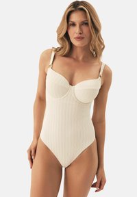 Слитный купальник