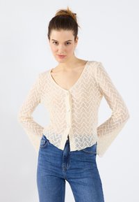 Вязаная кофта