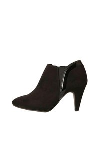 Широкие сапоги