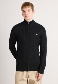 Вязаная кофта