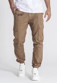 Брюки с накладными карманами