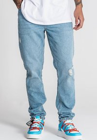 Прямые джинсы