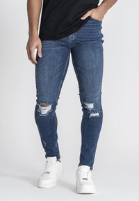 Узкие джинсы