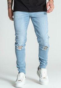 Узкие джинсы