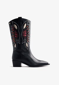 Ковбойские сапоги