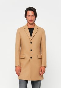 Шерстяное пальто