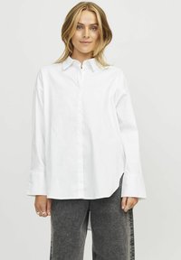 Длинная блузка