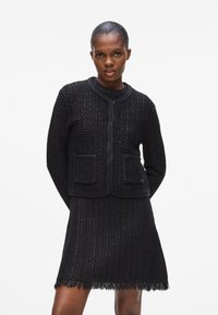 Вязаная кофта