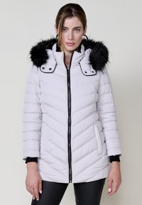 Длинная куртка