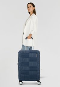 Чемодан на колесах