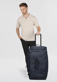 Чемодан на колесах