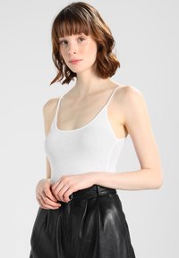 Длинный топ