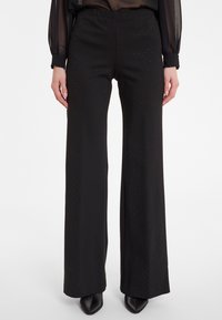 Широкие брюки Широкие брюки