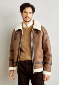 Кожаная куртка Кожаная куртка